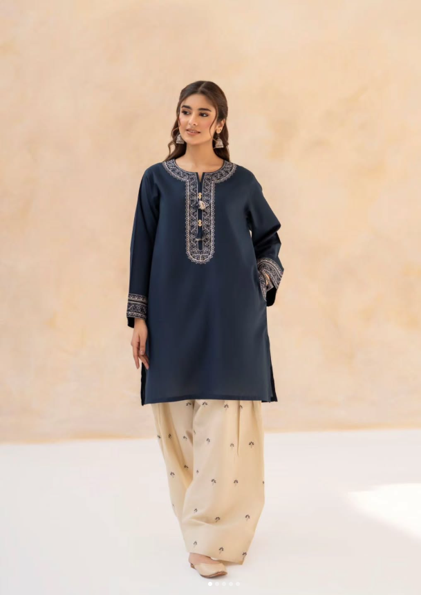 Shai Noor Nazo embroidered neckline detail on women's 2 piece embroidered suit made in Pakistan