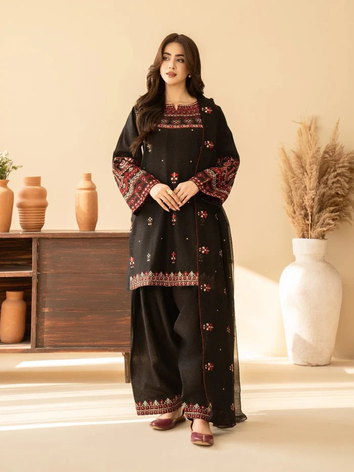 Shai Noor 3-piece embroidered lawn suit for women featuring intricate embroidery on fabric, made in Pakistan.